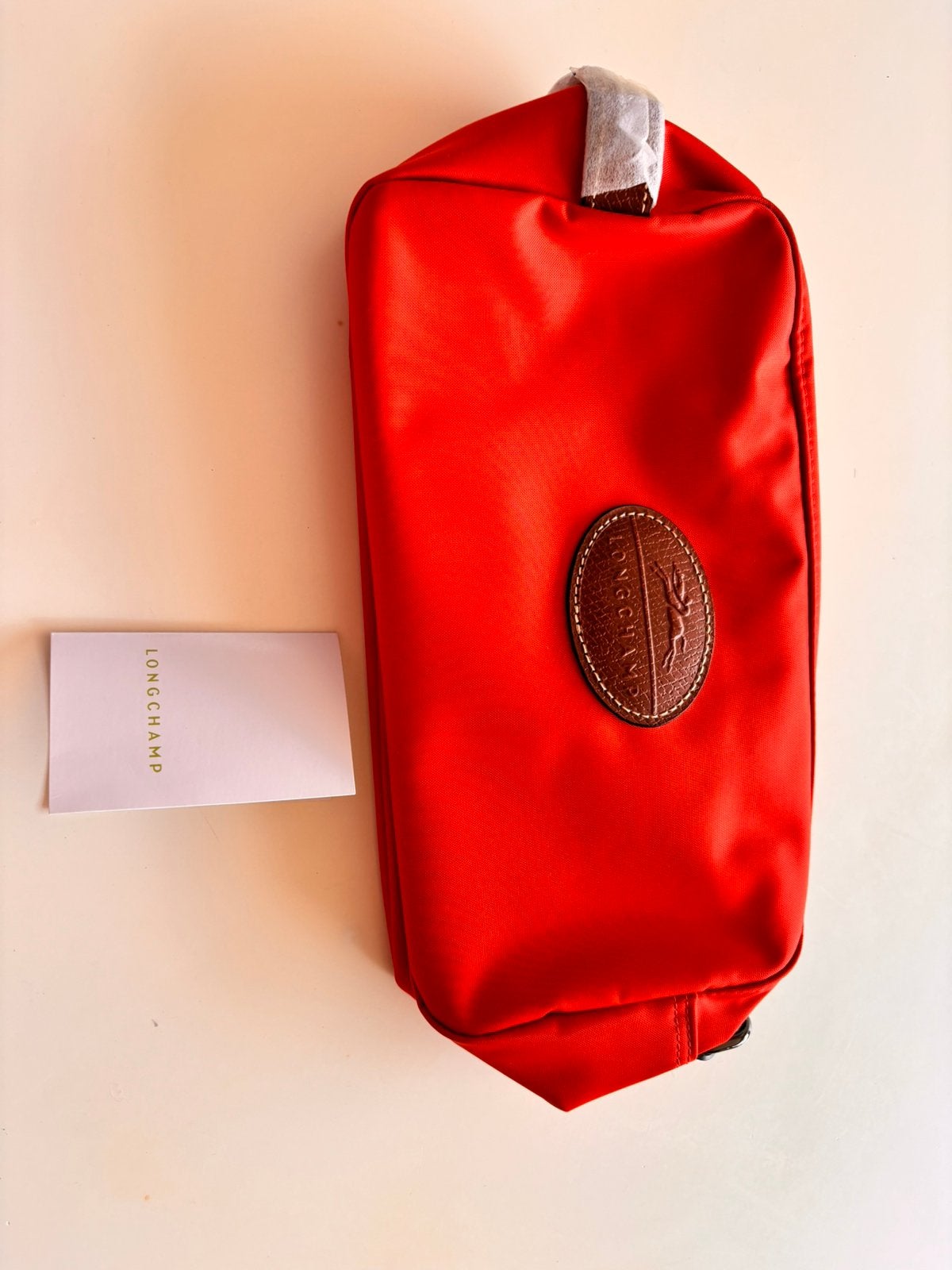 Trousse de toilette longchamps neuve avec étiquette, Handtassen en Accessoires, Ophalen, Nieuw, Rood