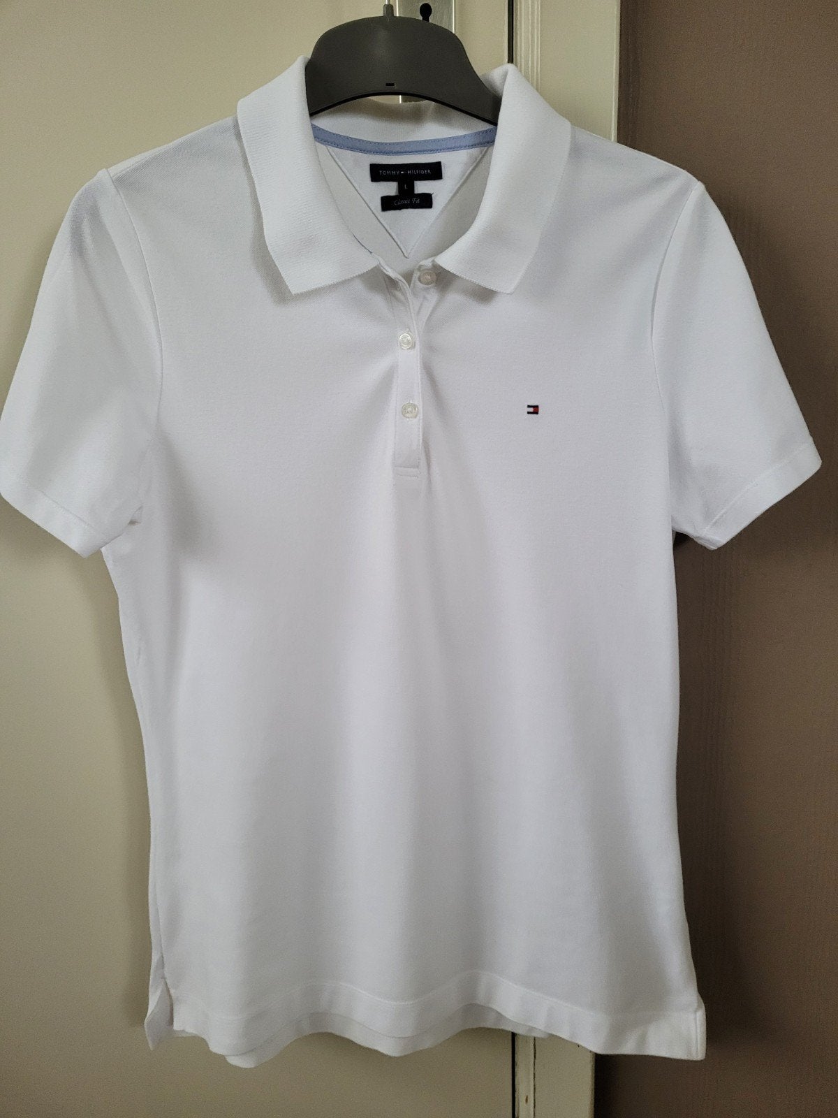 Dames polo merk Tommy Hilfiger, L...nieuw, Ophalen of Verzenden, Maat 42/44 (L), Wit