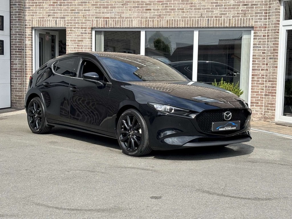 Mazda 3 2.0 M-HYBRID HOMURA (150pk) / 76000km / 12m wb, Auto's, Mazda, Voorwielaandrijving, Stof, 4 cilinders, Zwart