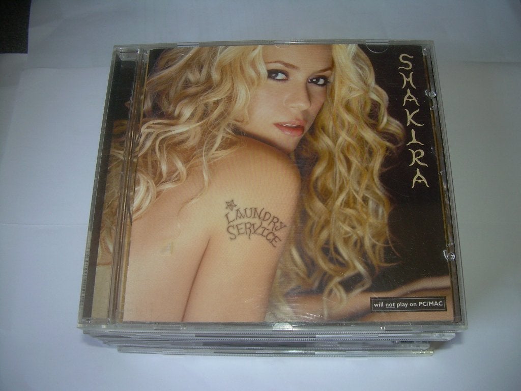 CD - SHAKIRA - SERVICE DE BLANCHISSERIE, Enlèvement ou Envoi, Premier pressage, Album, Dance populaire