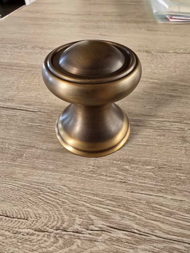 Deurtrekker knop, Ophalen