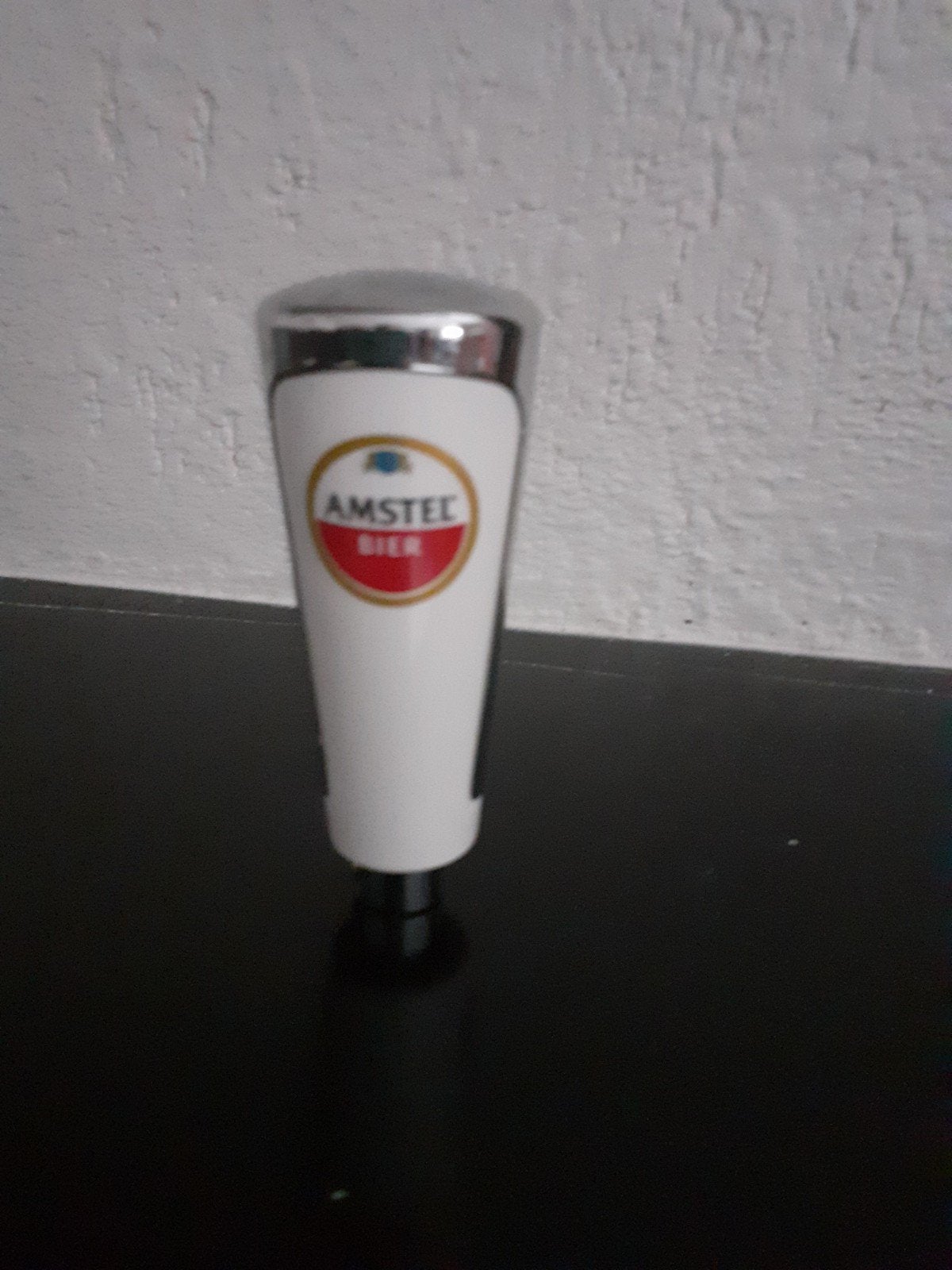 Taphendel,  tapknop van Amstel, Enlèvement ou Envoi, Amstel