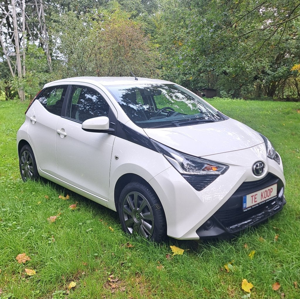 Toyota Aygo: 59.000km +airco +jaar garantie +groot nazicht!, Auto's, Voorwielaandrijving, 4 zetels, Stof, Euro 6