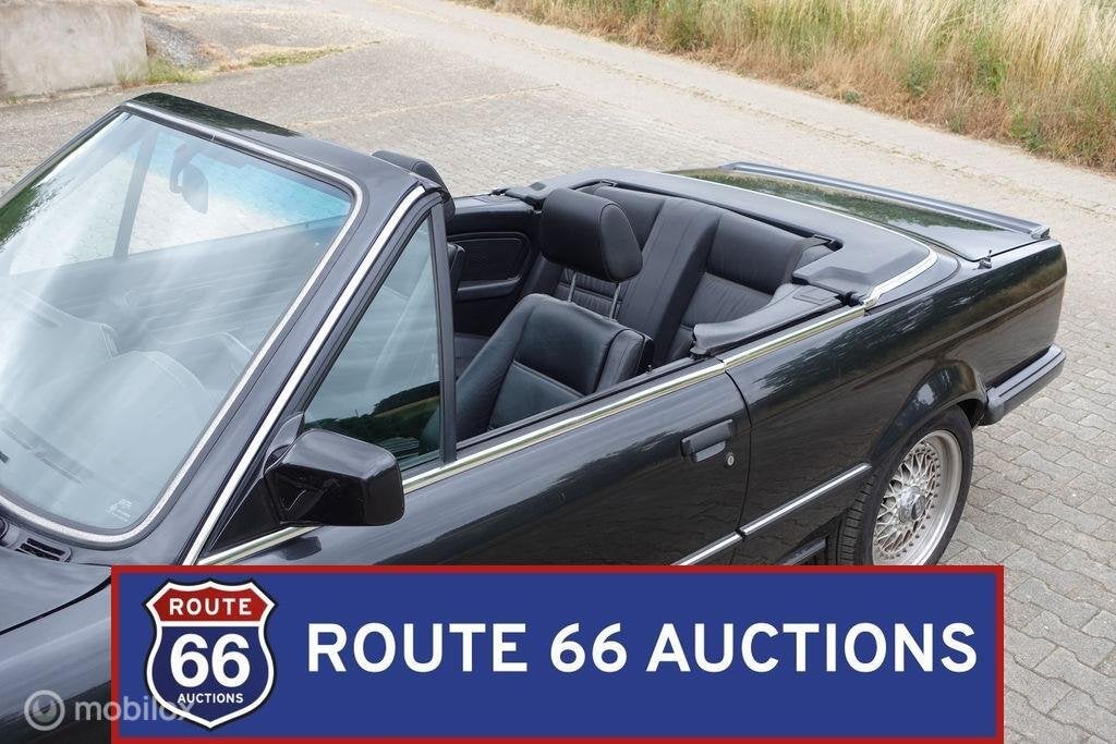 BMW 320i Cabriolet | 1987 | Route 66 Auctions, Zwart, Bedrijf, Handgeschakeld, Overige carrosserie
