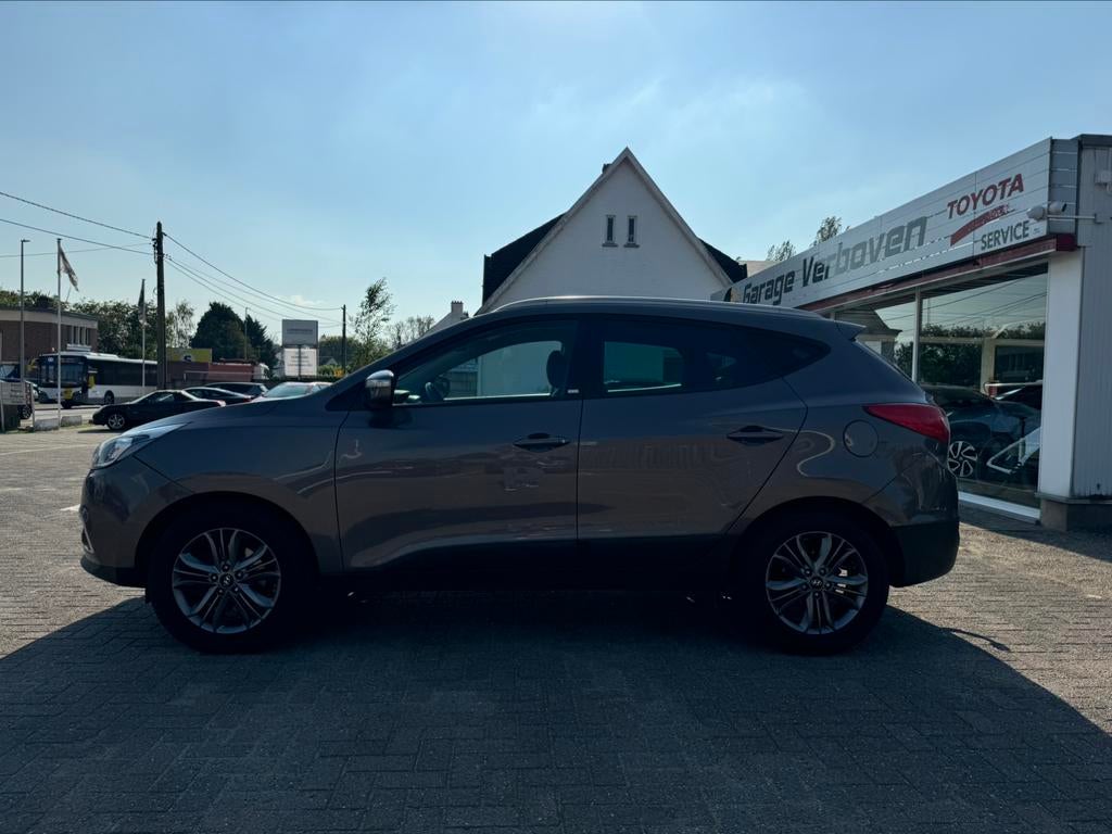 HYUNDAI IX35 NAVI|AIRCO|PRKSNSR|TRKHAAK, Euro 5, Stof, 1995 cc, Zwart