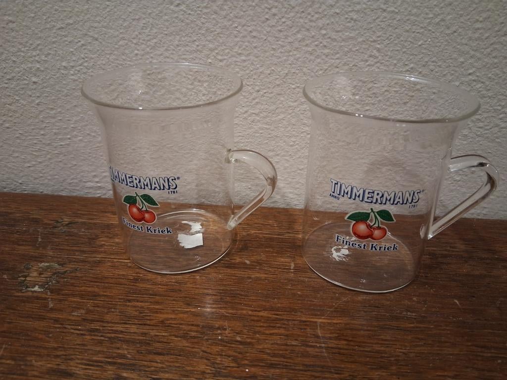 2 antieke glaasjes met oor van Timmermans finest Kriek, Verzamelen, Biermerken, Ophalen, Zo goed als nieuw, Glas of Glazen, Overige merken