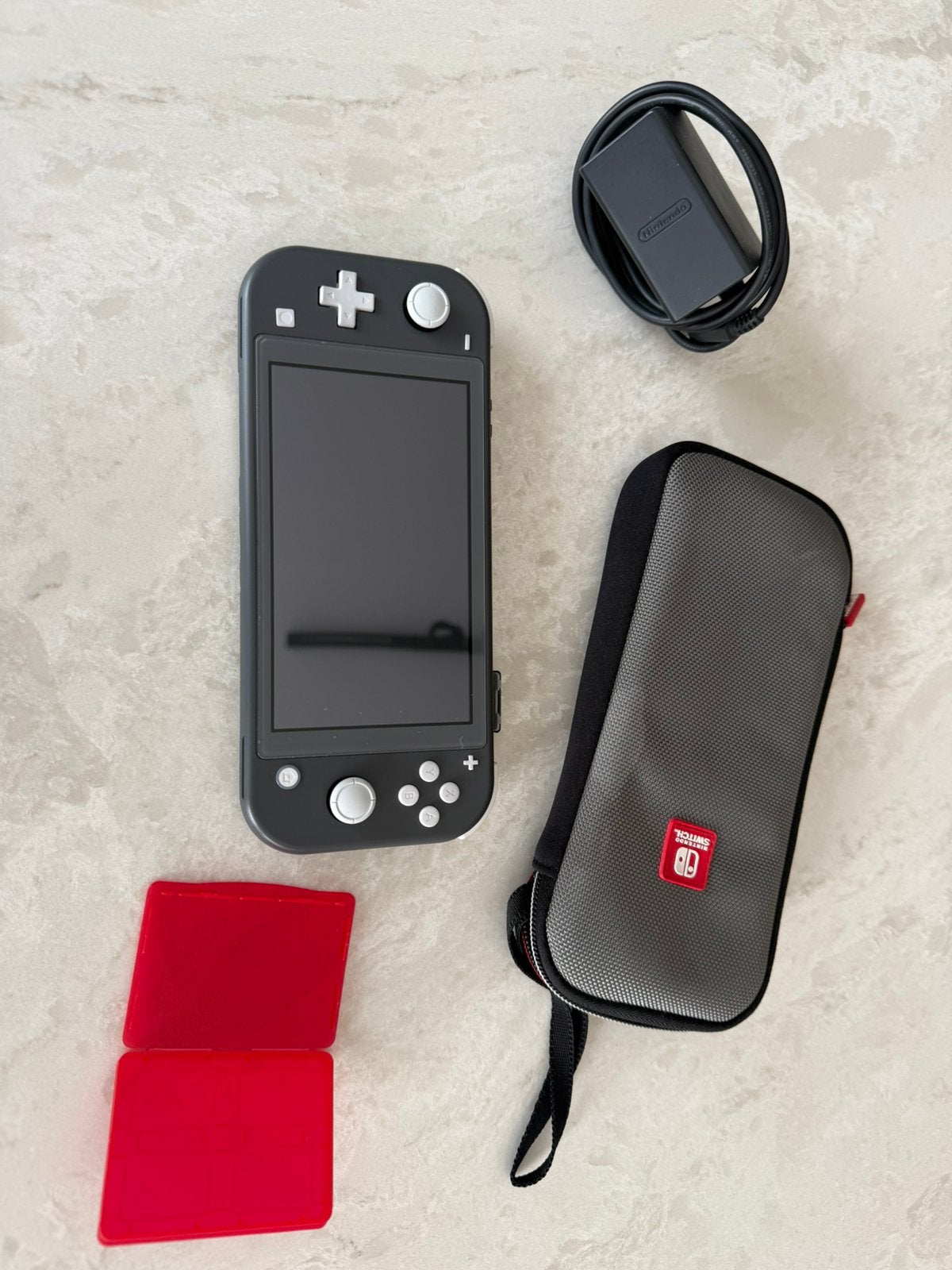 Nintendo switch lite + opberghoes + oplader, Ophalen of Verzenden, Zo goed als nieuw