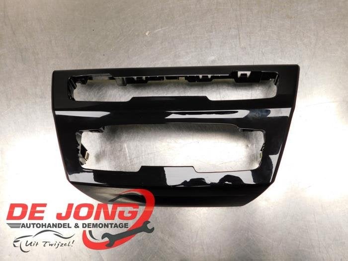 Cadre radio d'un BMW X1, -, 3 mois de garantie, Utilisé, -