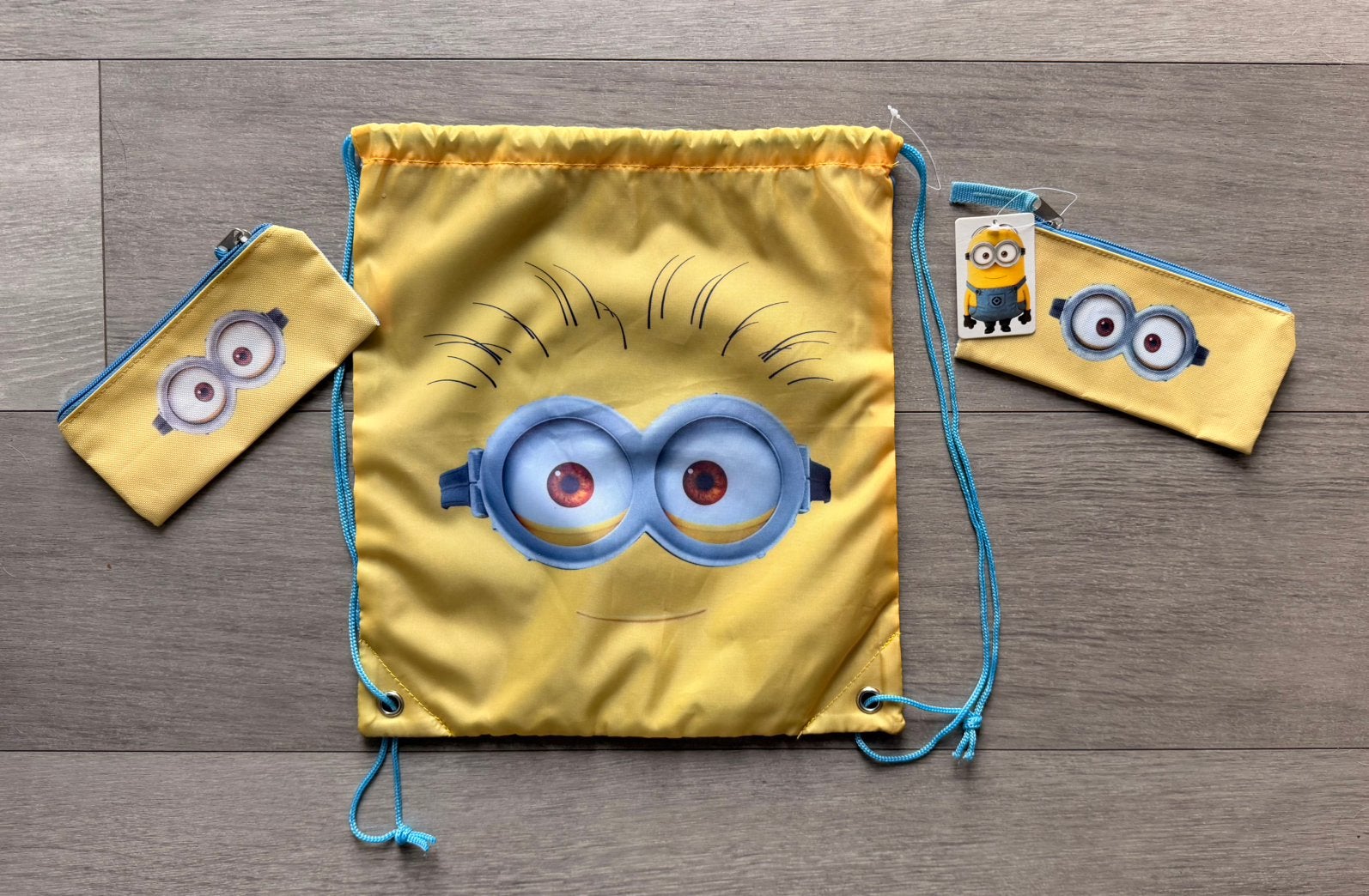 Minions set: zwemzak + 2 pennenzakken geel/blauw- school, Ophalen of Verzenden, Zo goed als nieuw