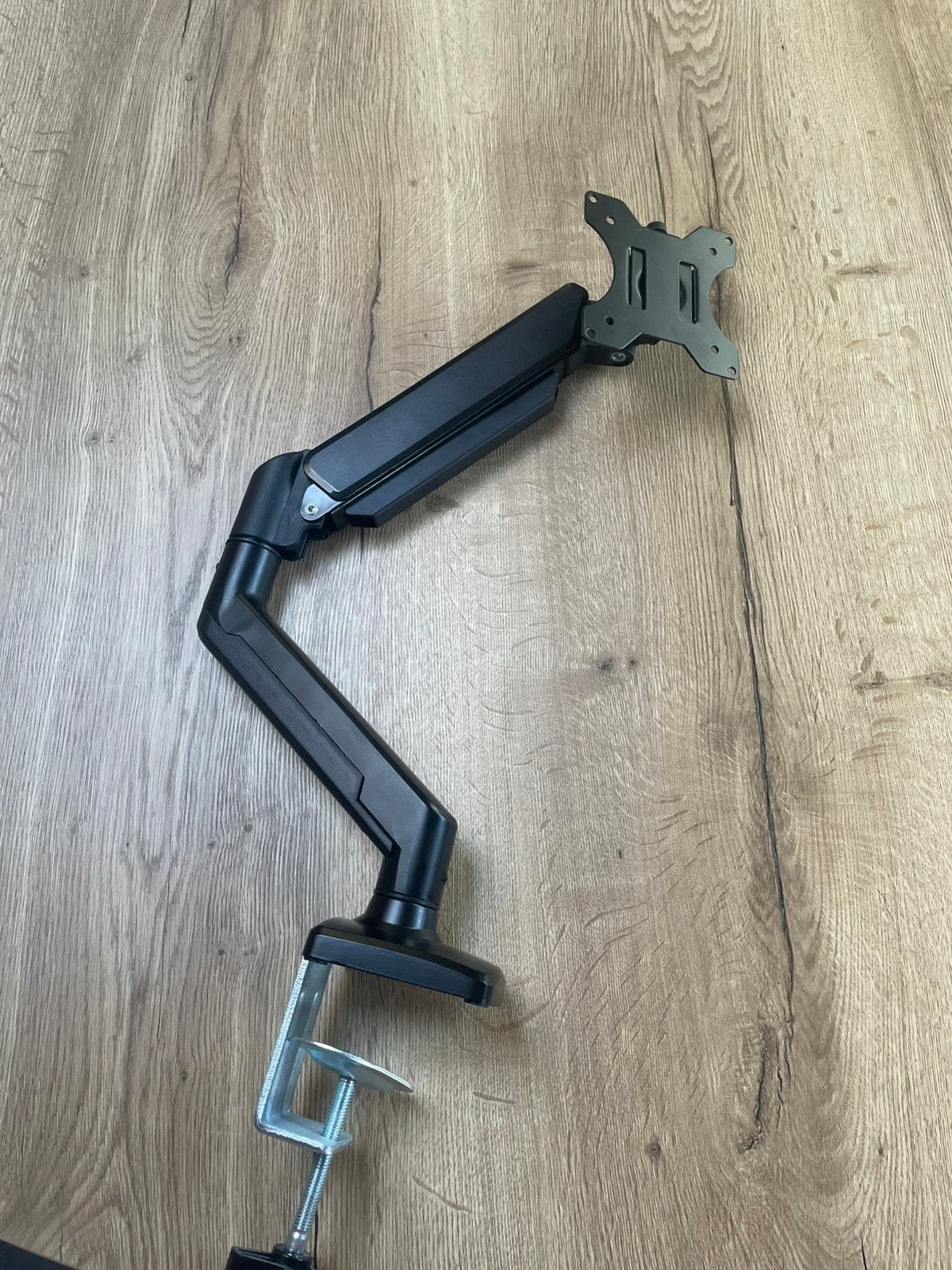 Monitor arm met gasveer, Ophalen