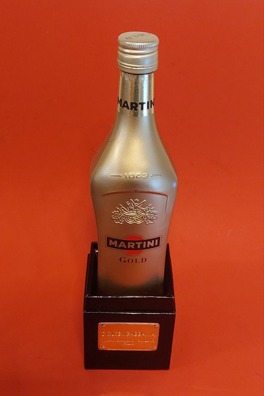 Martini goud... Dolce & Gabbana, Ophalen of Verzenden