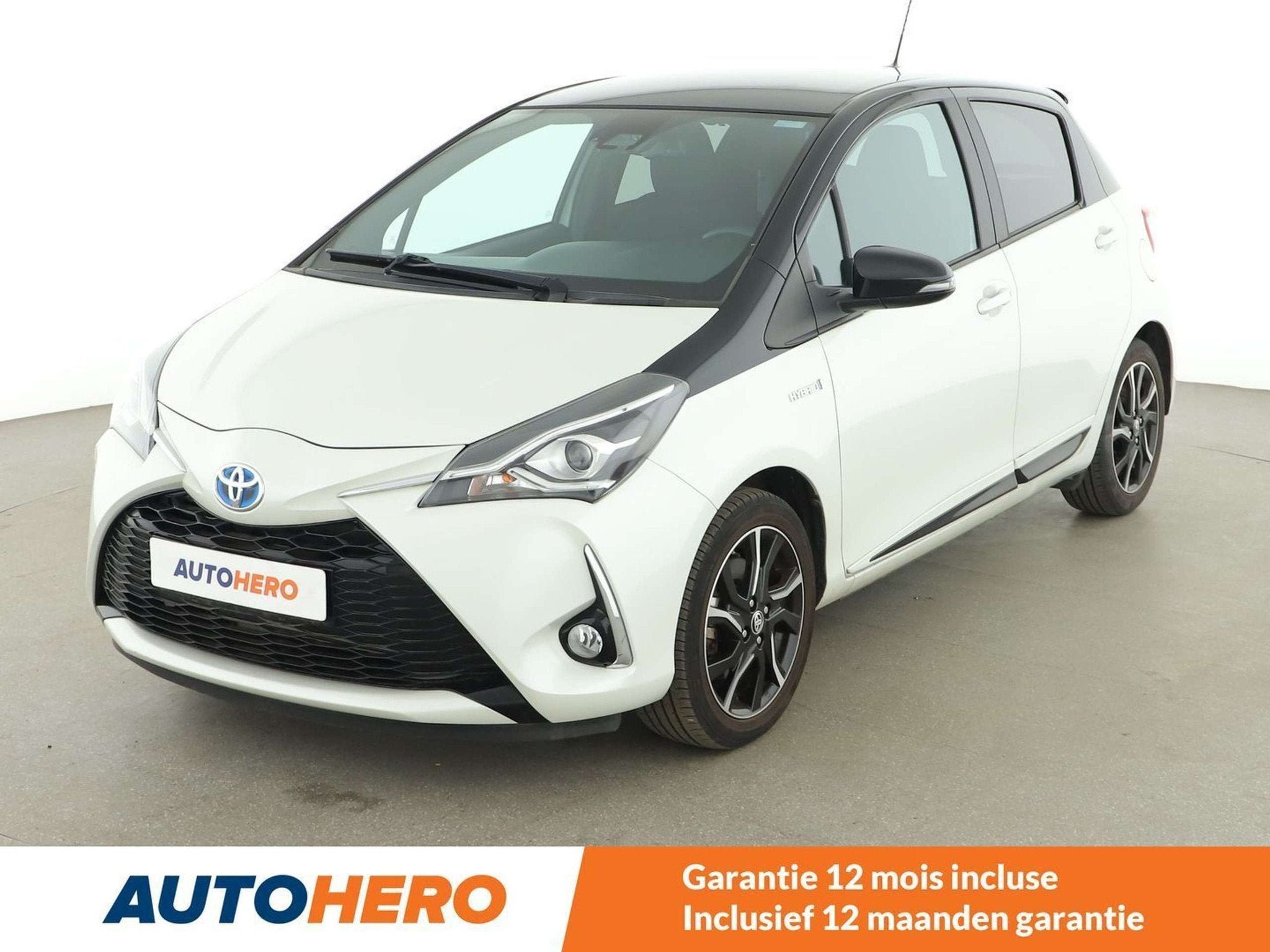 Toyota Yaris 1.5 Hybrid (bj 2018, automaat), Auto's, Gebruikt, Wit, 5 zetels, Hybride Elektrisch/Benzine