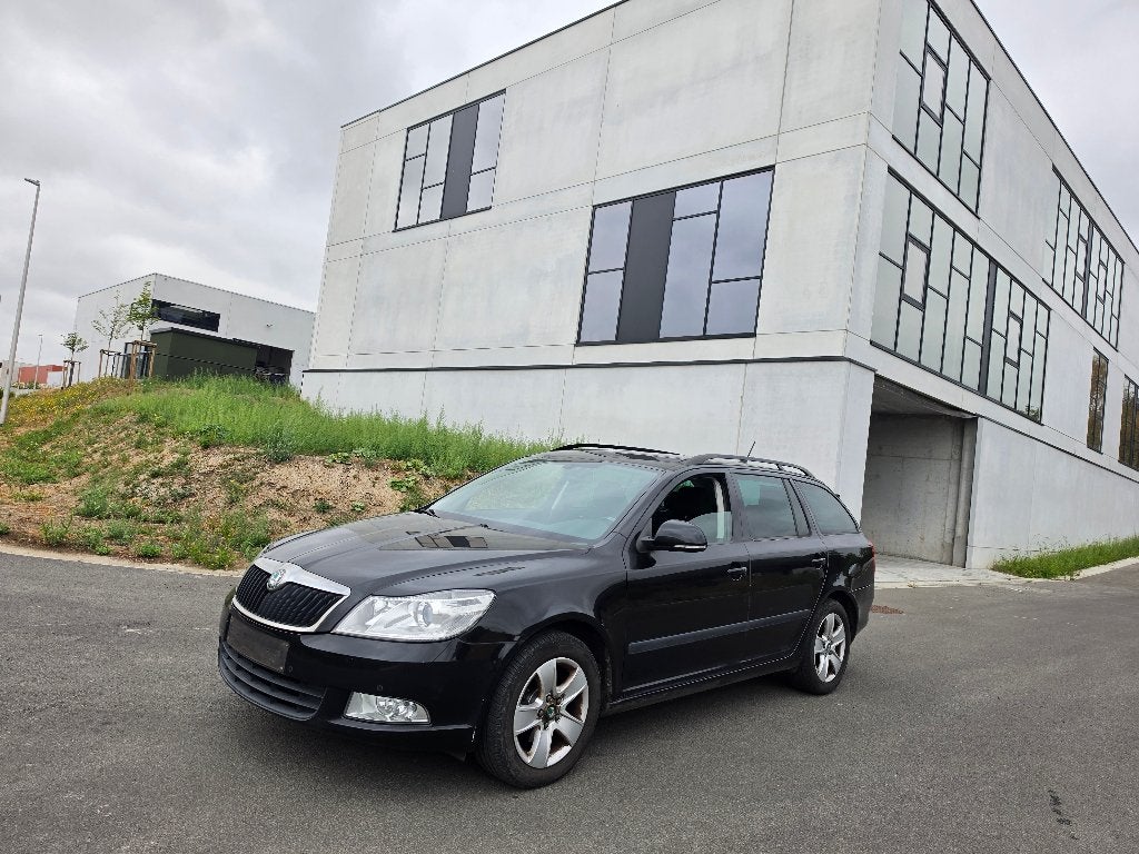 Skoda Octavia 1.6tdi - 205d km - 04/2013 - 1ste Eigenaar, Auto's, Stof, Zwart, 109 g/km, Zwart