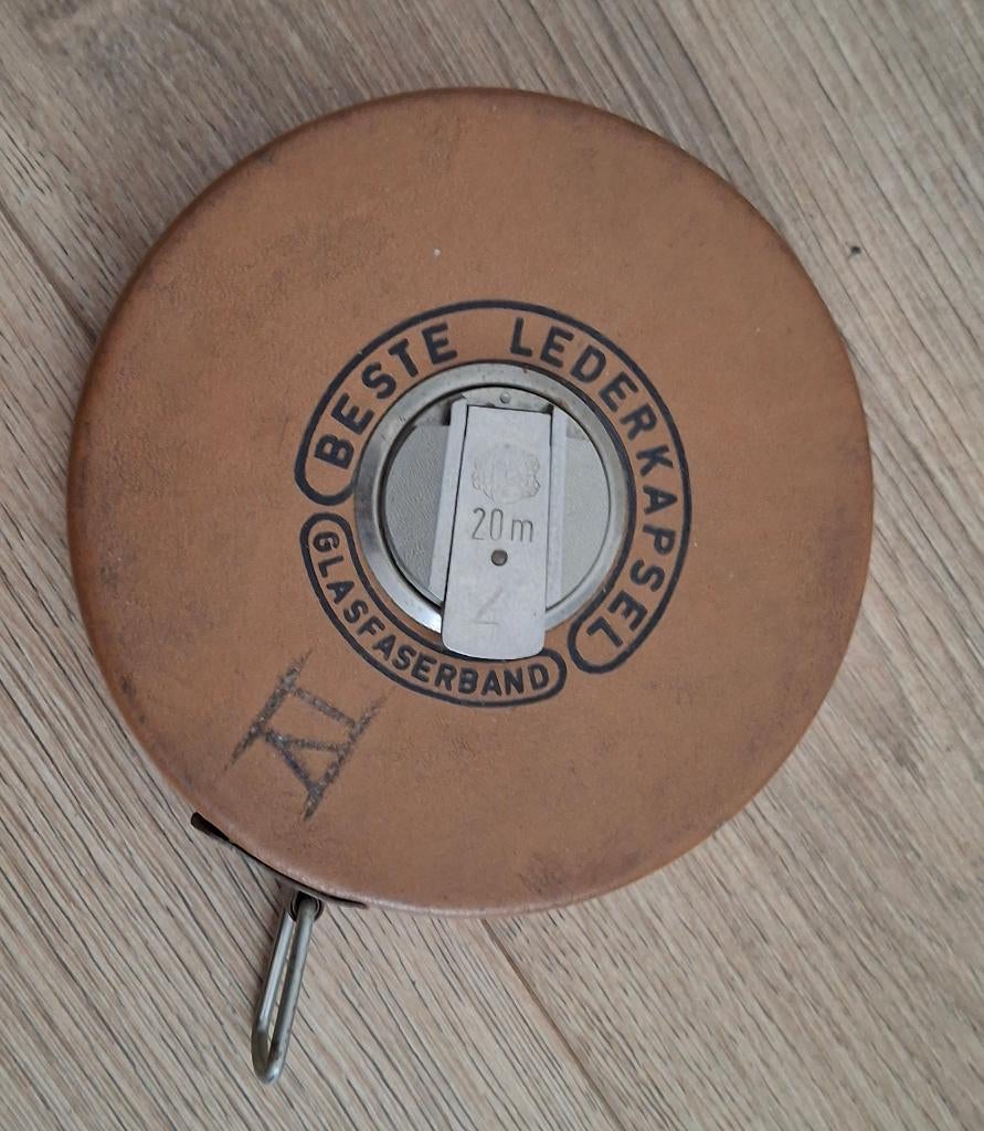 Oud meetlint van 20 meter „Beste Lederkapsel” — Vintage, Antiek en Kunst, Ophalen of Verzenden