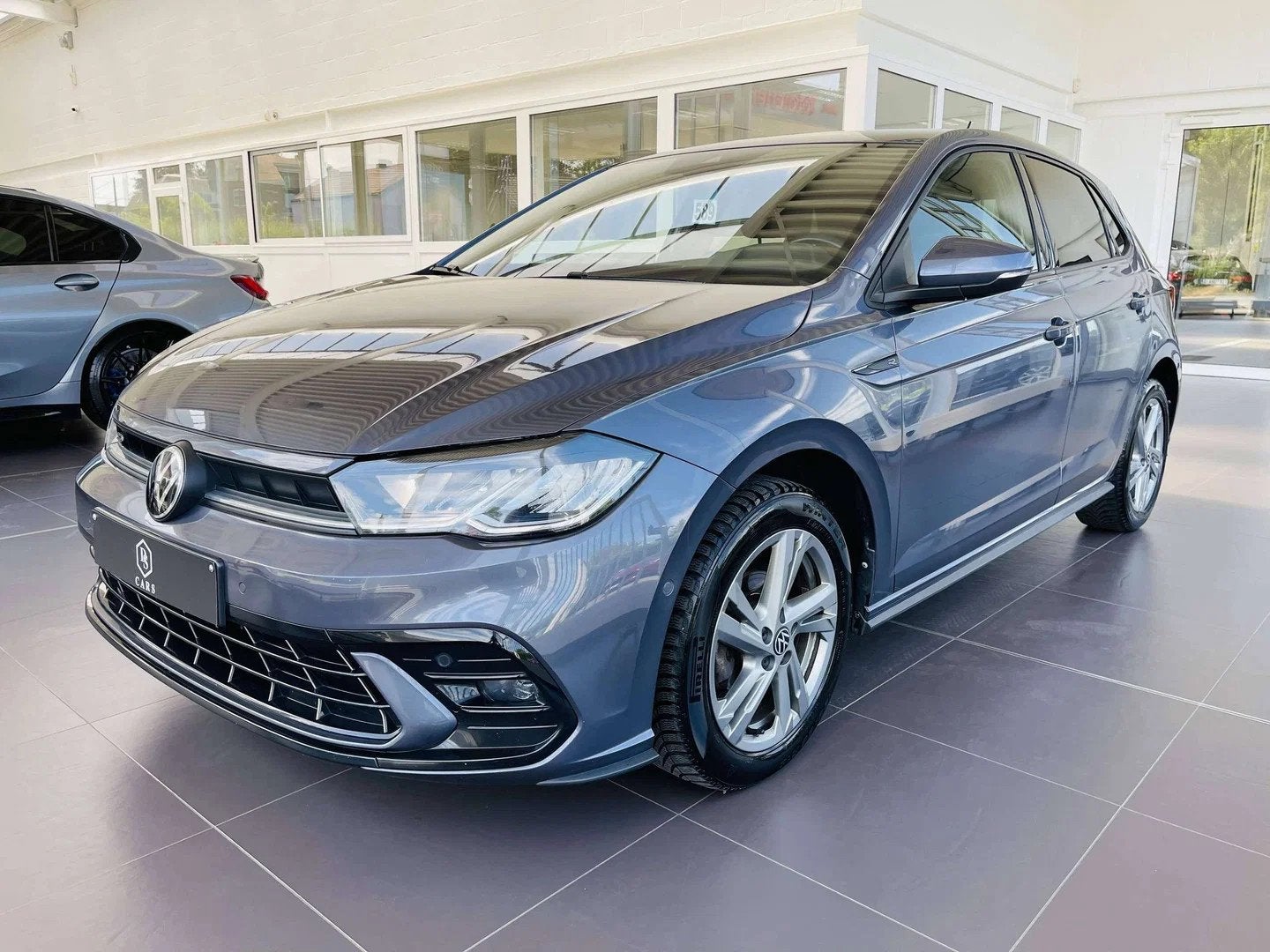 Volkswagen Polo 1.0 TSI * GARANTIE + R-LINE + COCKPIT + GPS, Auto's, Gebruikt, Euro 6, 95 pk, Adaptive Cruise Control