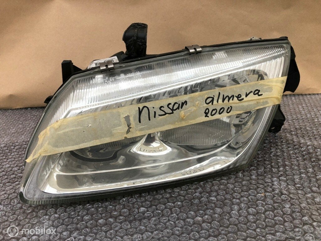 Koplamp links nissan almera Origineel, Auto-onderdelen, Gebruikt, Ophalen of Verzenden