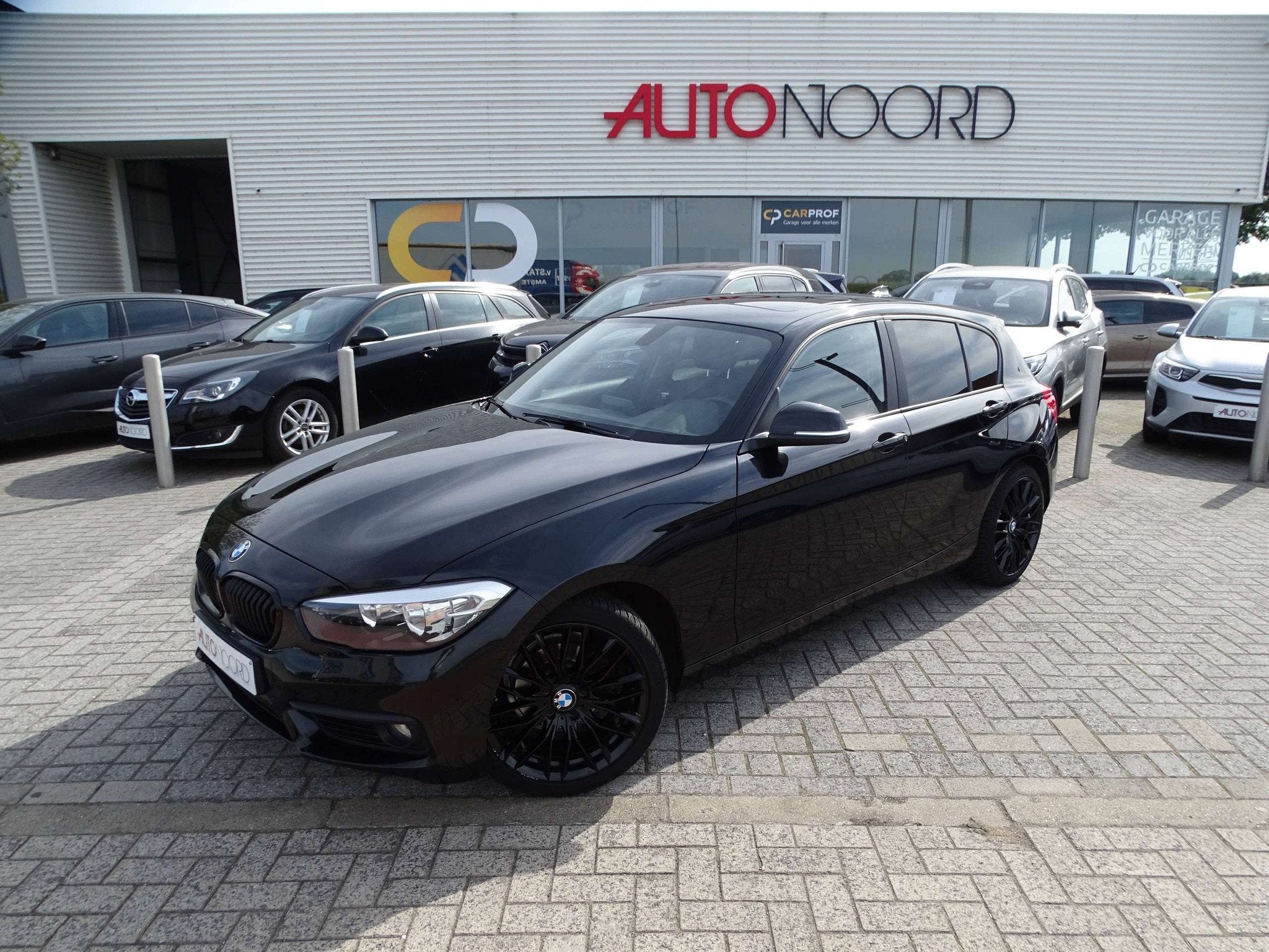 BMW 1 Serie 116 116i SPORT (bj 2018), Auto's, 116 g/km, Gebruikt, Zwart, 5 deurs