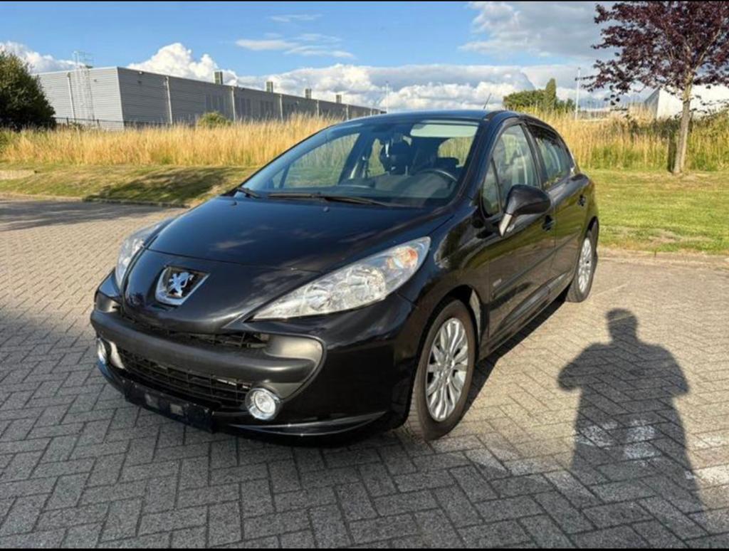 Peugeot 207 1.4 2009, Auto's, Voorwielaandrijving, 4 cilinders, Zwart, 5 deurs