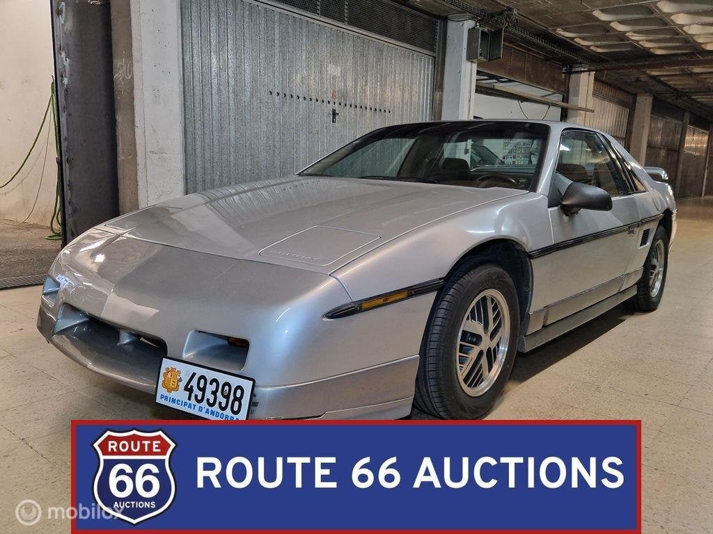 Pontiac Fiero | 1985 | Route 66 Auctions, Autos, Achat, Pontiac, Entreprise, Boîte manuelle