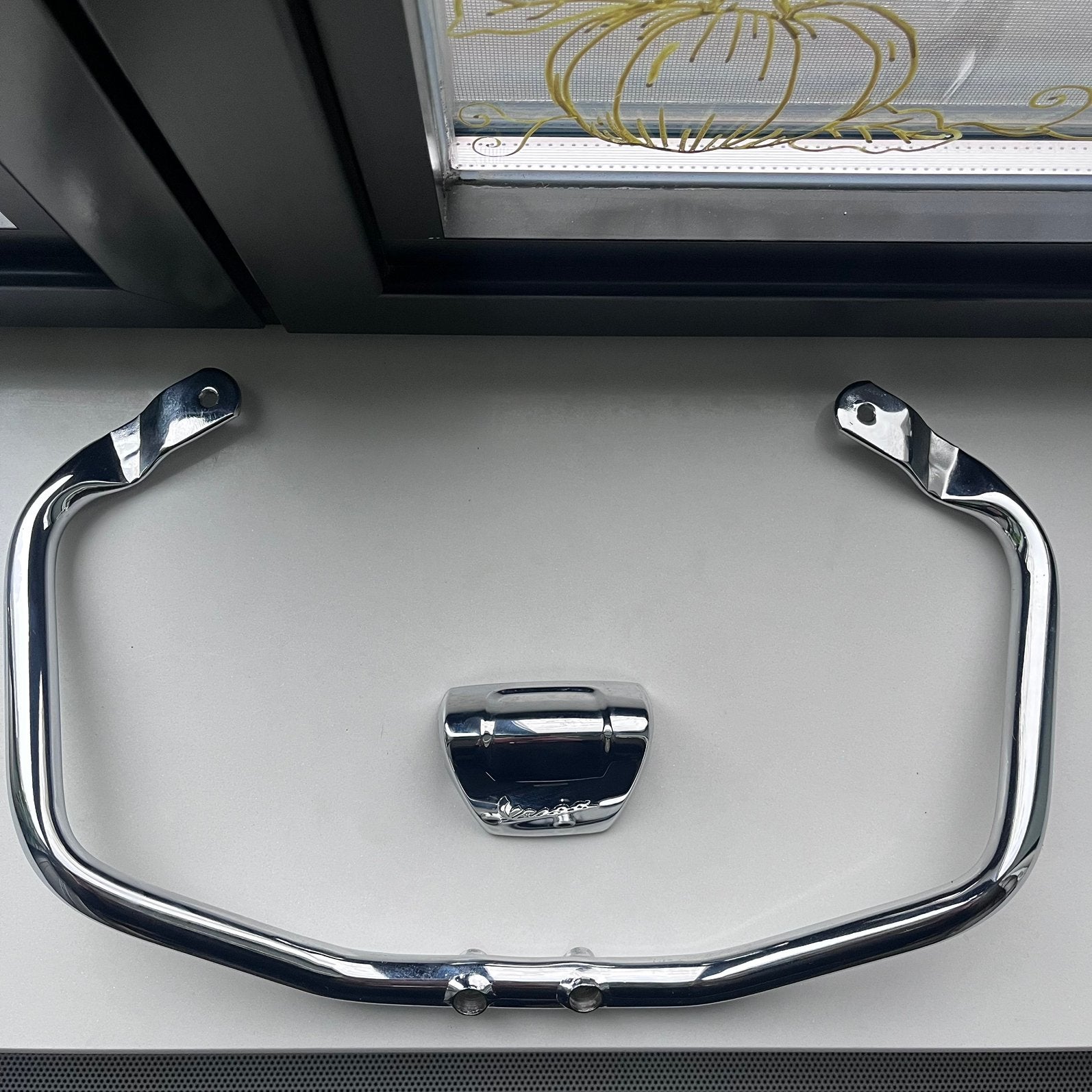 Oppakbeugel chrome origineel Vespa Sprint/primavera, Ophalen