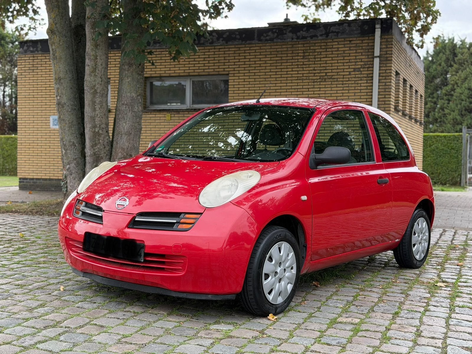 Nissan Micra 1.3 essence , airco , 130.000km , 05.2005., Autos, Nissan, Rouge, Entreprise, Boîte manuelle, Noir