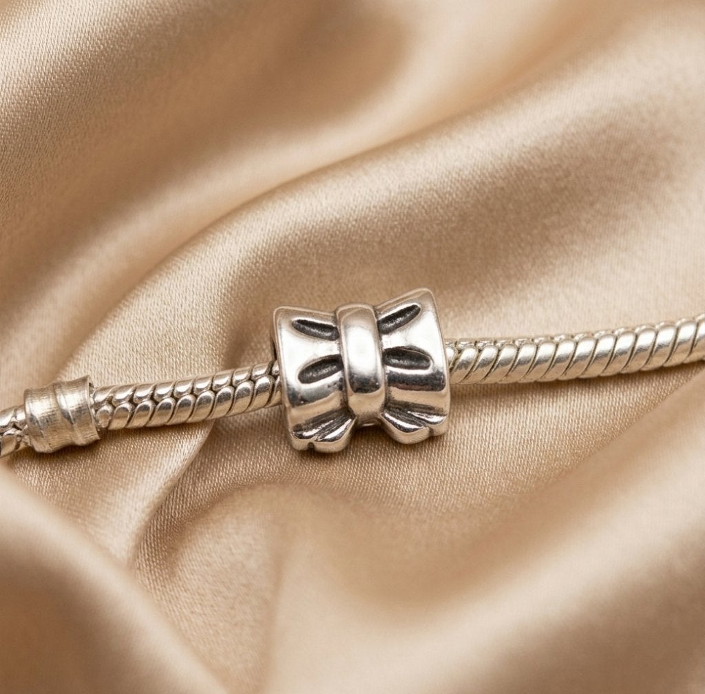 Bedel Charm voor bedelarmband strik zilver, Overige merken, Nieuw, Ophalen of Verzenden, 1 bedel