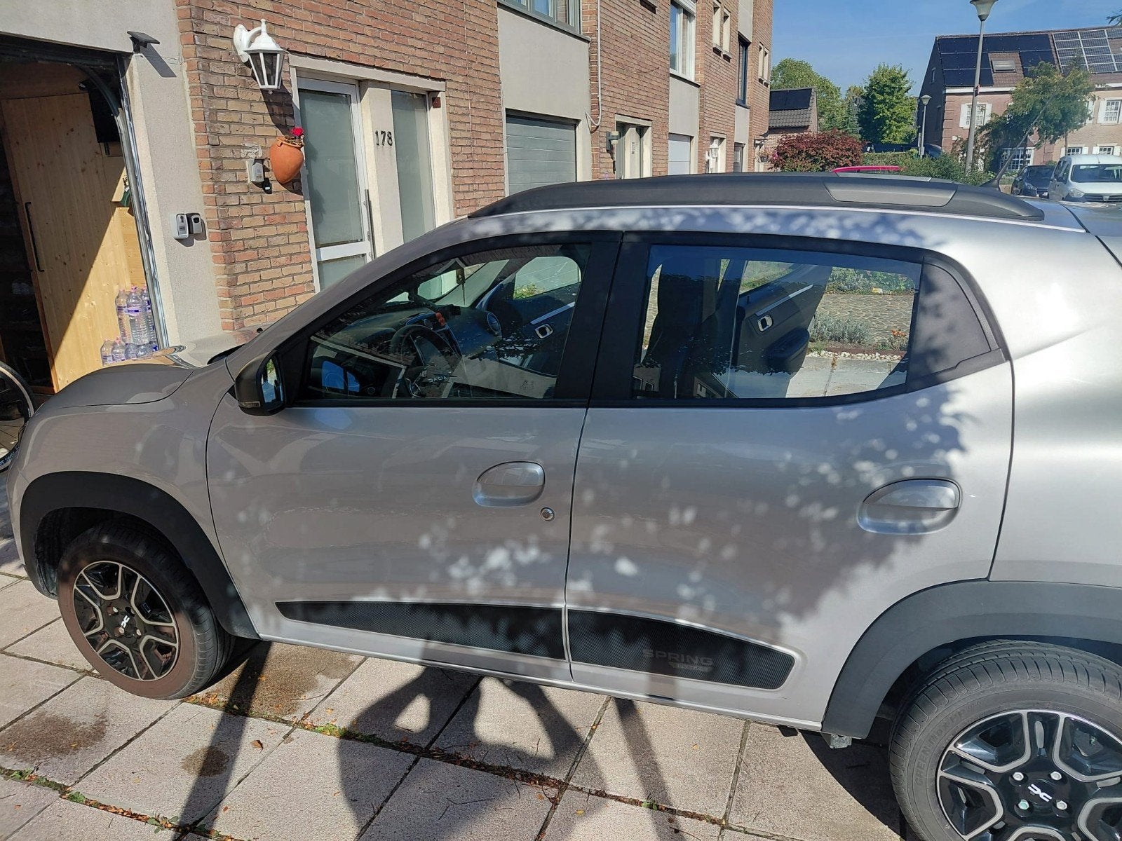 2023 Dacia Spring, Autos, Argent ou Gris, Achat, Noir, Automatique