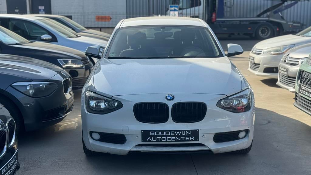 Bmw 1 Serie 116i 1.6Benzine 2012 157.xxxkm/Carplayy,Android, Auto's, Automaat, Zwart, Wit, https://public.car-pass.be/vhr/4d40ad46-b5e4-413b-bcb0-d481c80b19a8