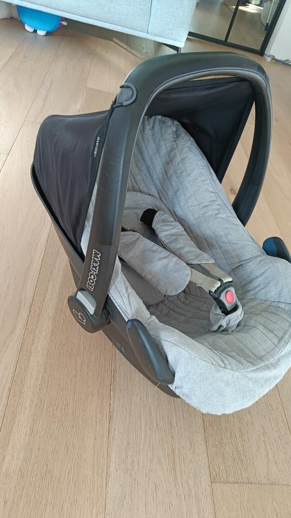 Maxi cosi. Met beschermhoes van first, Ophalen
