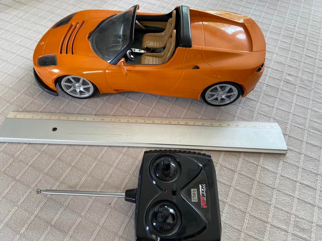 Tesla met afstandsbediening, Hobby en Vrije tijd, Ophalen of Verzenden, Zo goed als nieuw