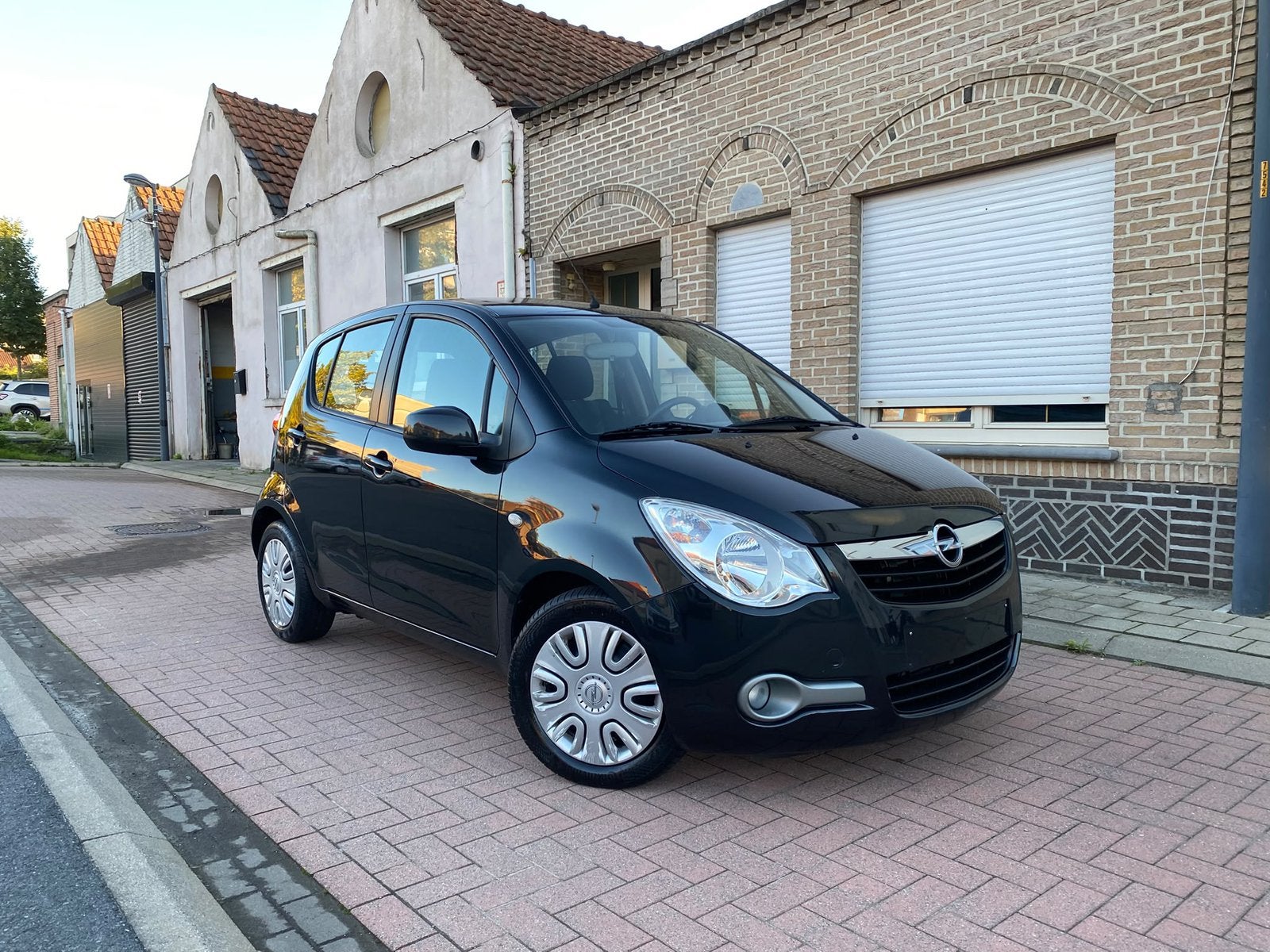Opel Agila 1.2i Benzine / 2013 / 48000.km / Automaat / Airco, Auto's, Stof, 4 cilinders, Zwart, USB