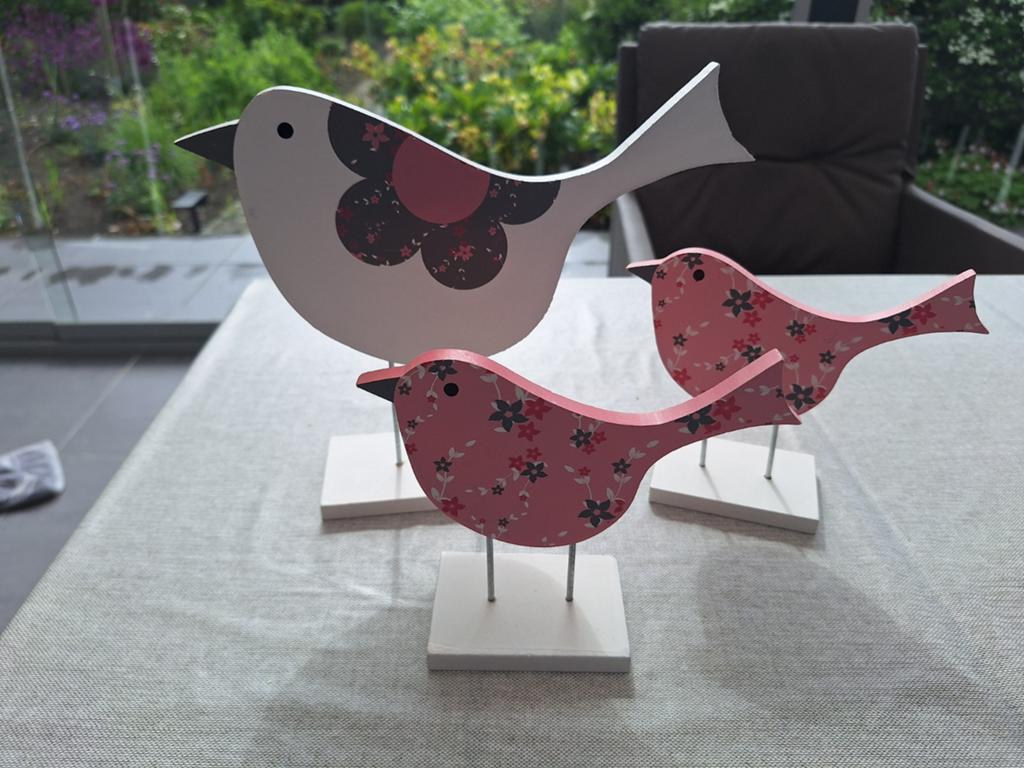 Houten vogels, Ophalen