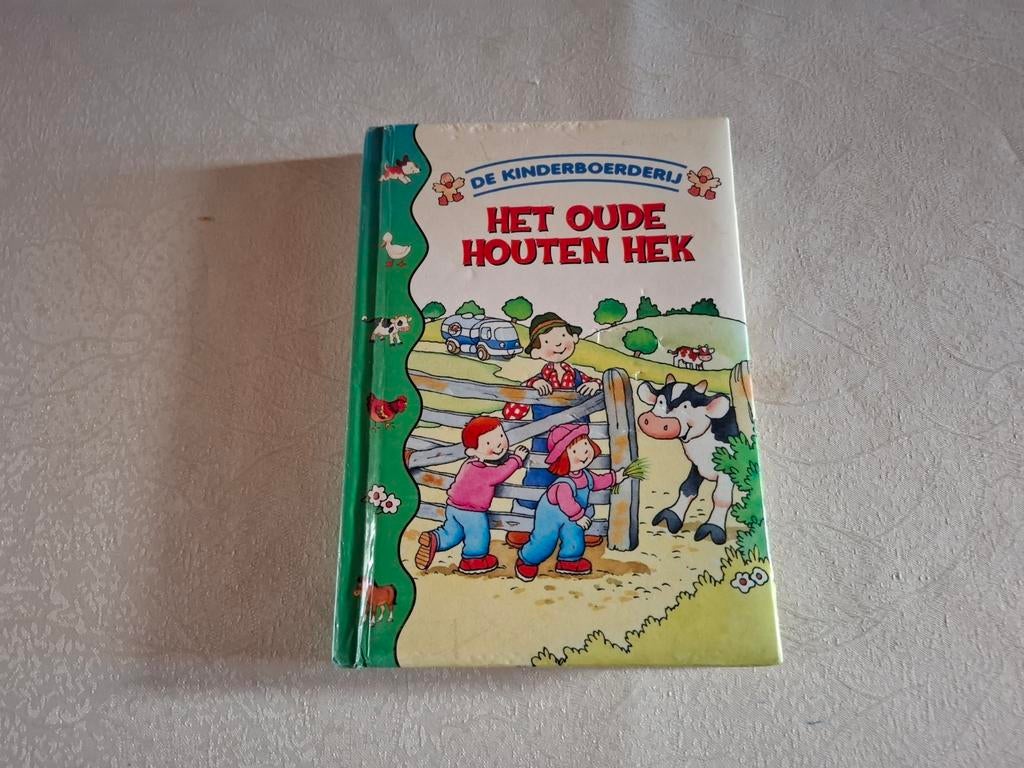 Boek Het oude houten hek, Enlèvement ou Envoi, Comme neuf