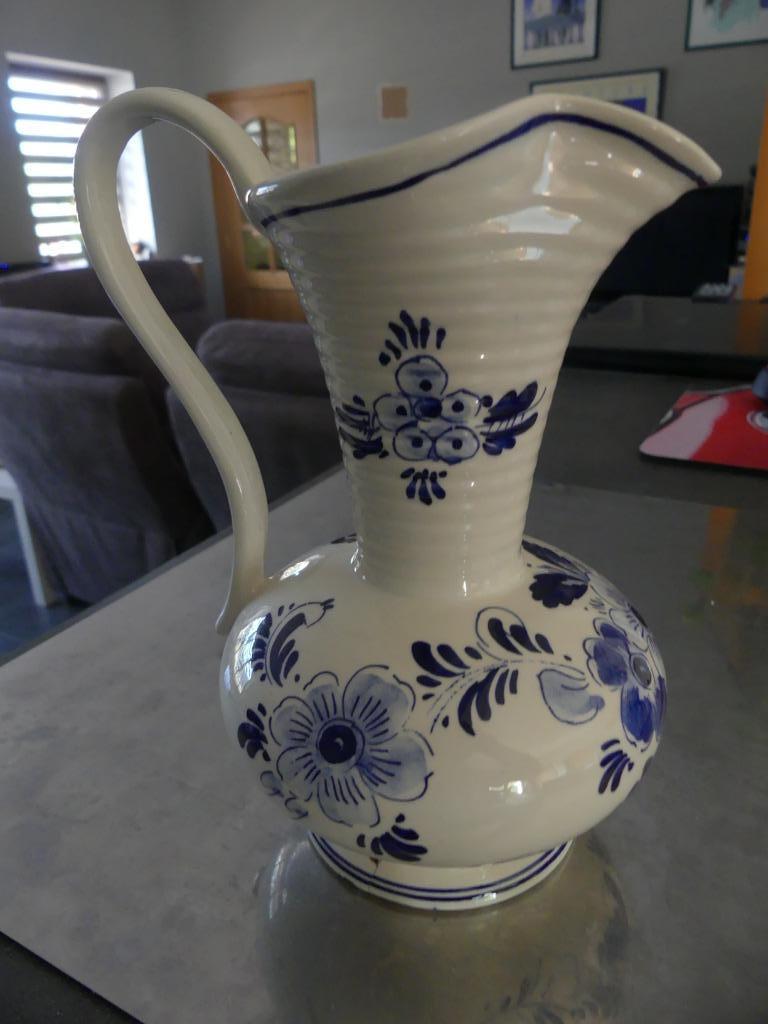 Cruche Delft, Ophalen
