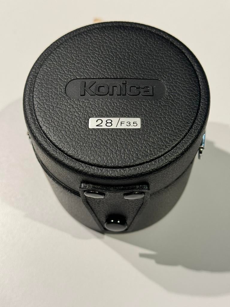 KONIKA HEXANON AR 28mm F 3.5 + pare-soleil, TV, Hi-fi & Vidéo, Photo | Lentilles & Objectifs, Comme neuf, Objectif grand angle