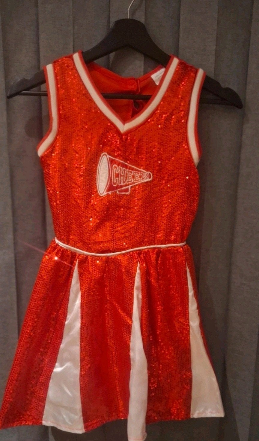 Costume , déguisement rouge paillettes 9-10 ans
• Desc, Enlèvement ou Envoi