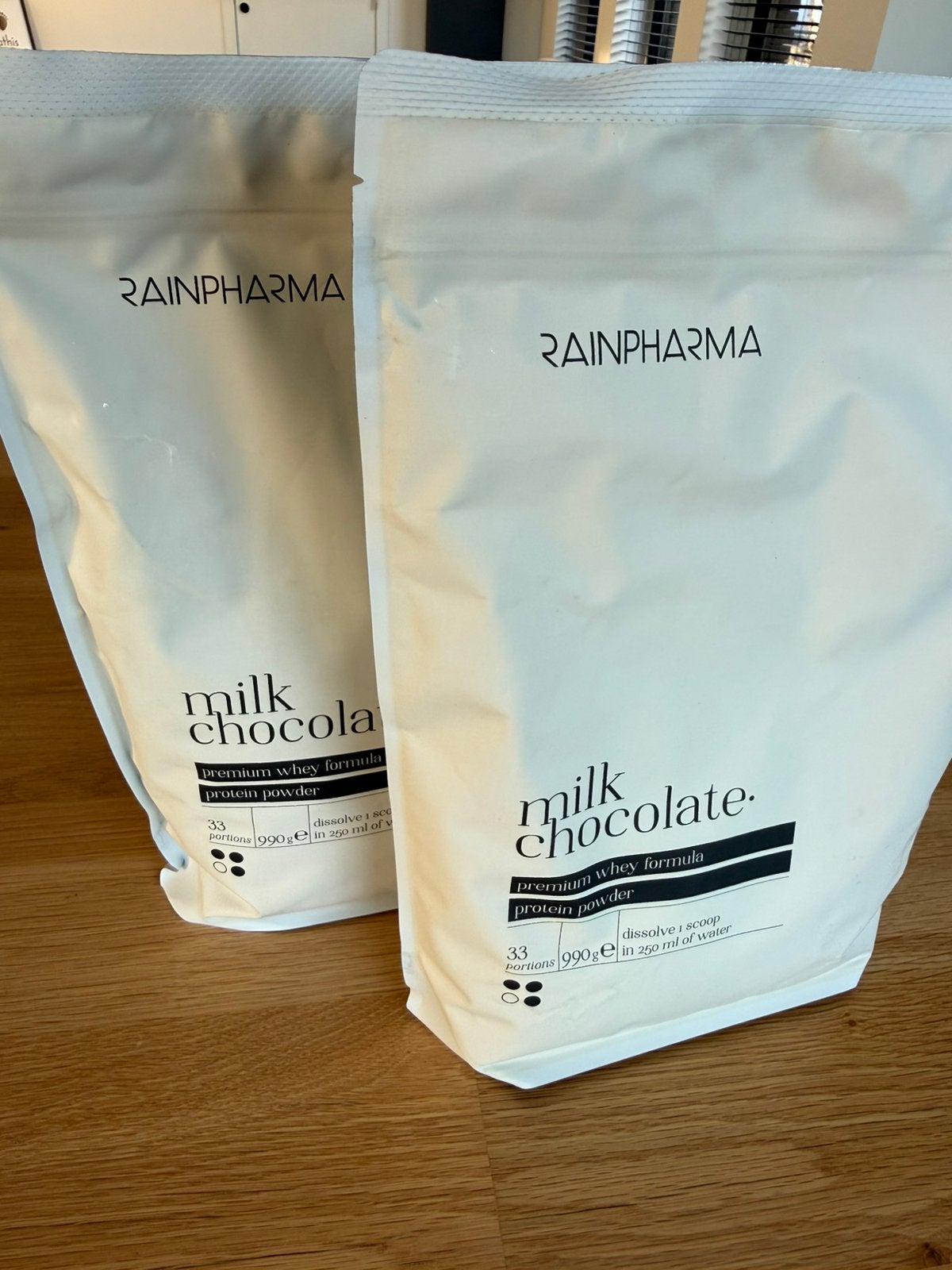 RainPharma Milk Chocolate - Protein powder shake - 2x 990g, Sport en Fitness, Ophalen of Verzenden, Nieuw