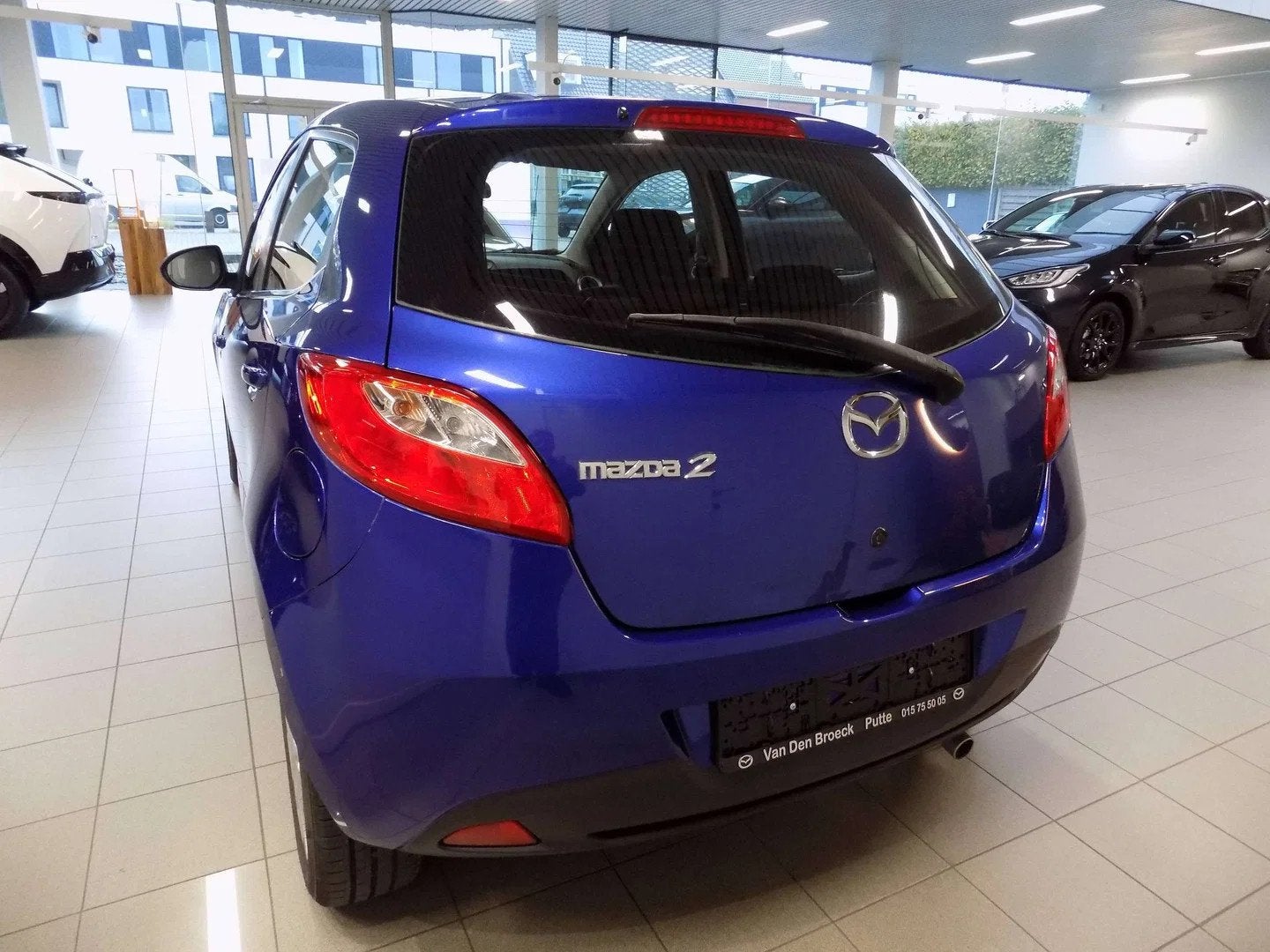 Mazda 2 1.3i 86pk Active (bj 2009), Stof, Gebruikt, 4 cilinders, Blauw
