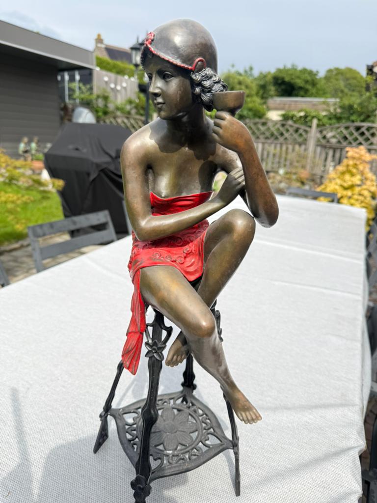 Mooi bronzen beeld, Ophalen