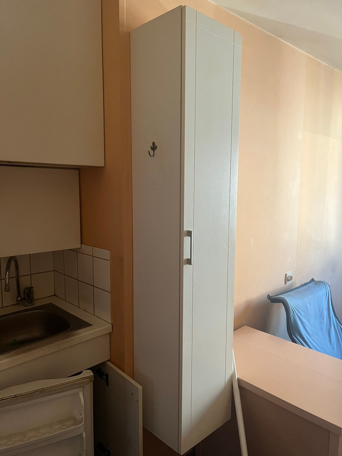 Keuken/boekenkast, Ophalen