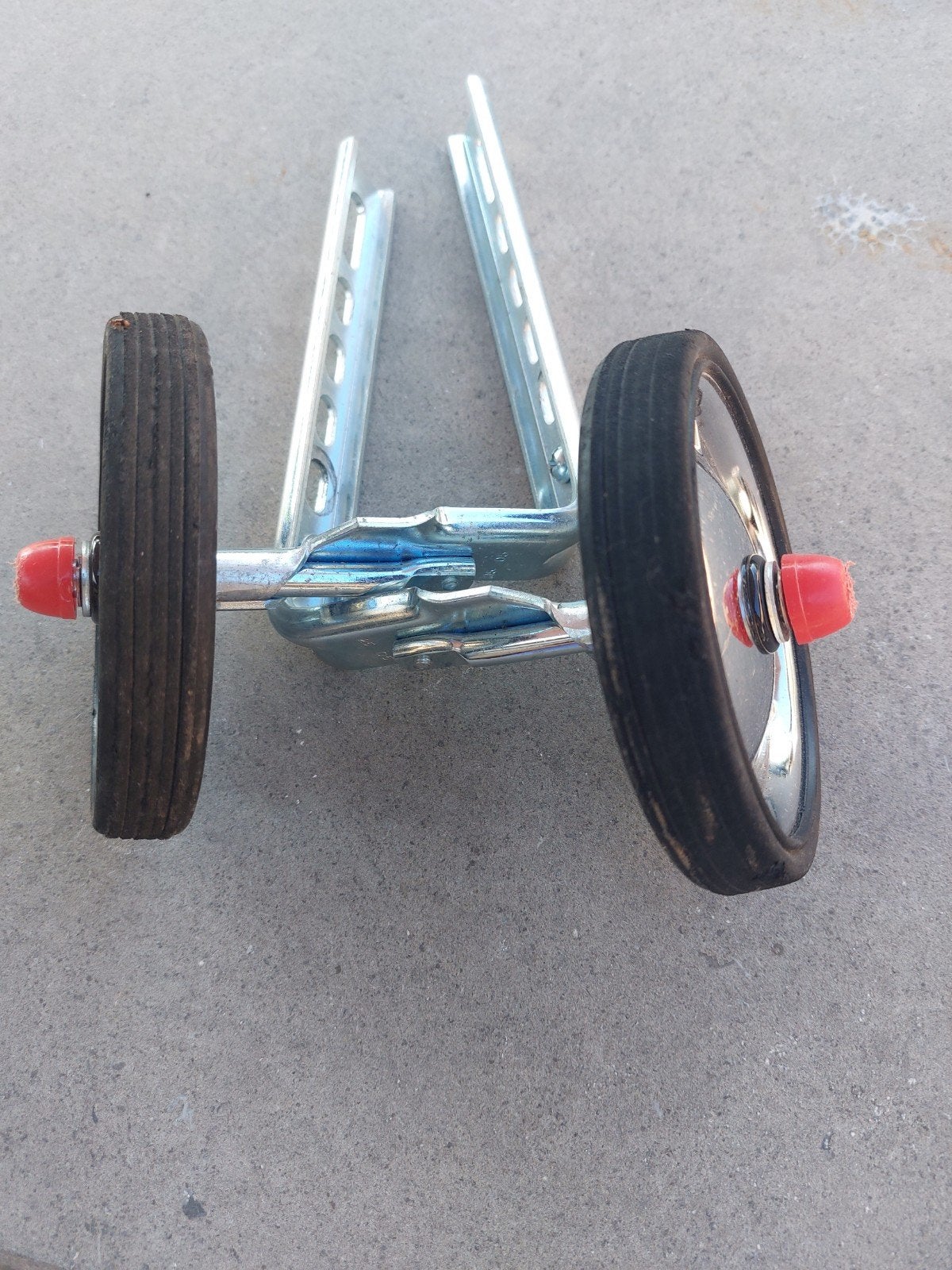 Extra zijwielen voor kinderfiets, Ophalen