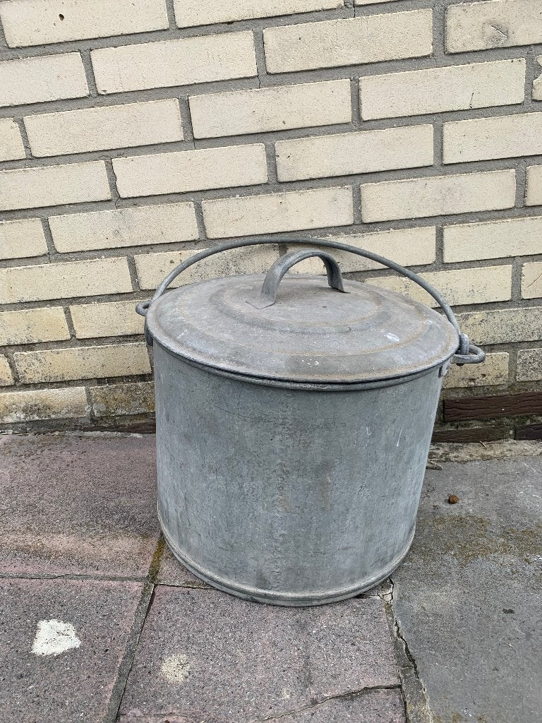 Galvanisé ton met deksel en hengsel, Enlèvement