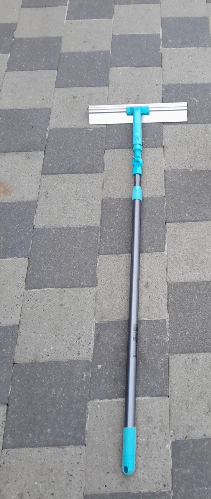 raamwisser met uitschuifbare steel, Ophalen