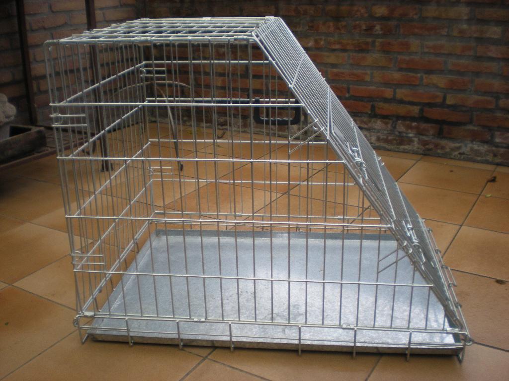 ijzer transportkooi voor honden, Enlèvement