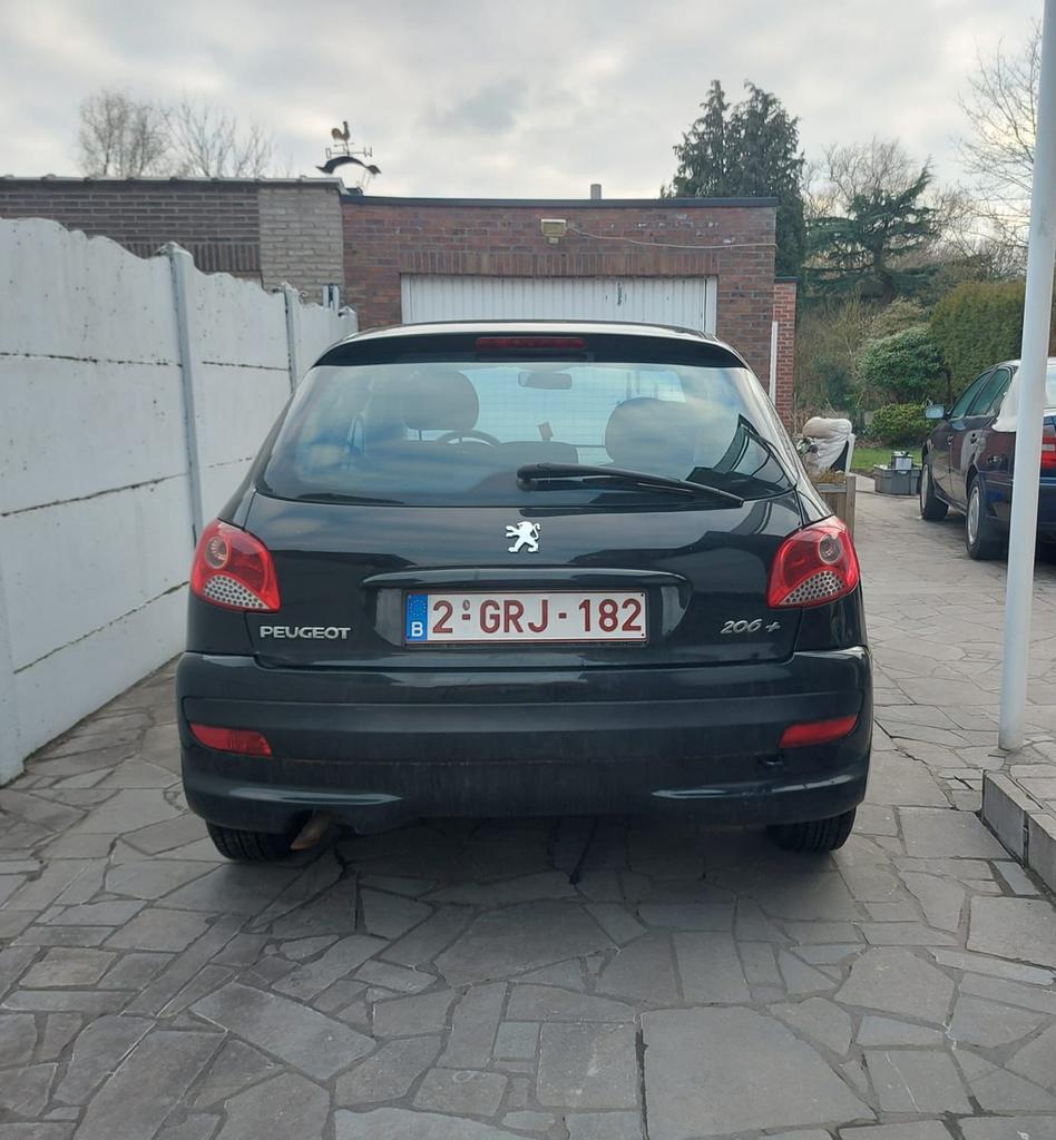 Peugeot 206+ benzine 1.4 2010 GEKEURD, Auto's, Voorwielaandrijving, 206+, Stof, Zwart