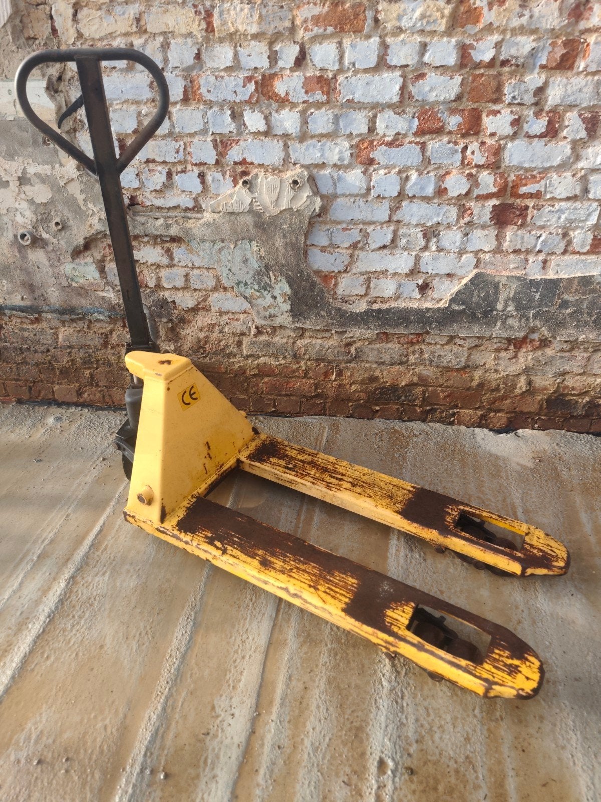 Handmatige pallettruck., Ophalen