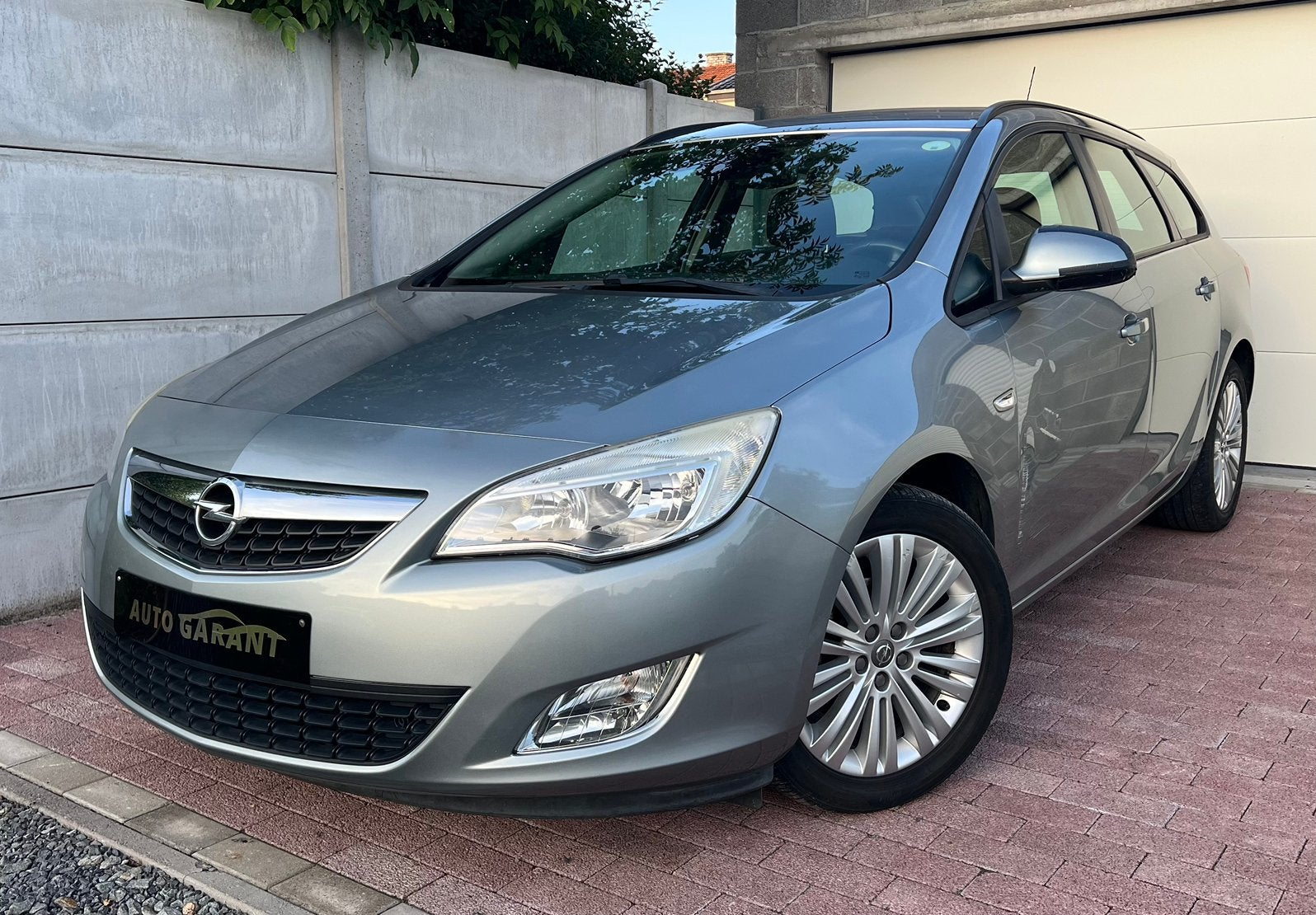 Opel Astra Sport Tourer, Auto's, Euro 5, https://public.car-pass.be/vhr/5c7a95a2-46d7-47cb-b64d-44dda7e6f90c, Bedrijf, 5 deurs