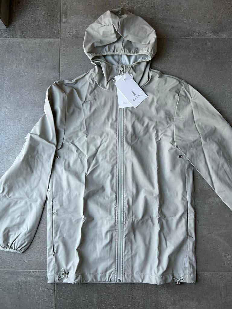Rains - Lichtgrijze regenjas. Maat XXS/XS. Nieuw, Ophalen of Verzenden, Nieuw, Maat 36 (S), Grijs