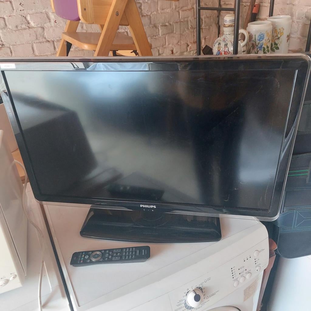 Phillips tv 32 inch met afstandsbediening, Ophalen