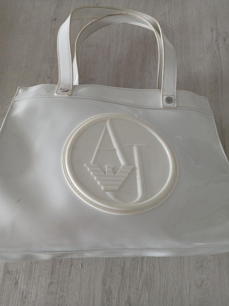 Handtas armani, Ophalen